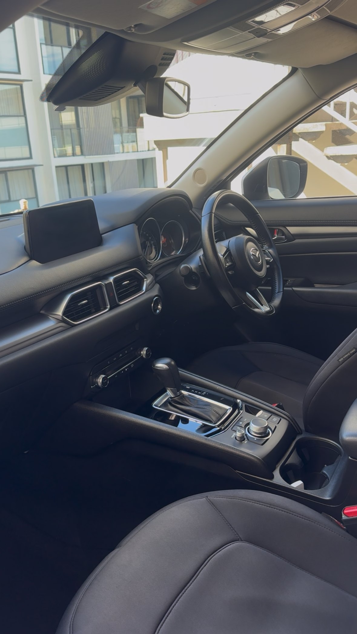 Mazda CX-5 interior detailed — dashboard, steering wheel and leather seats cleaned