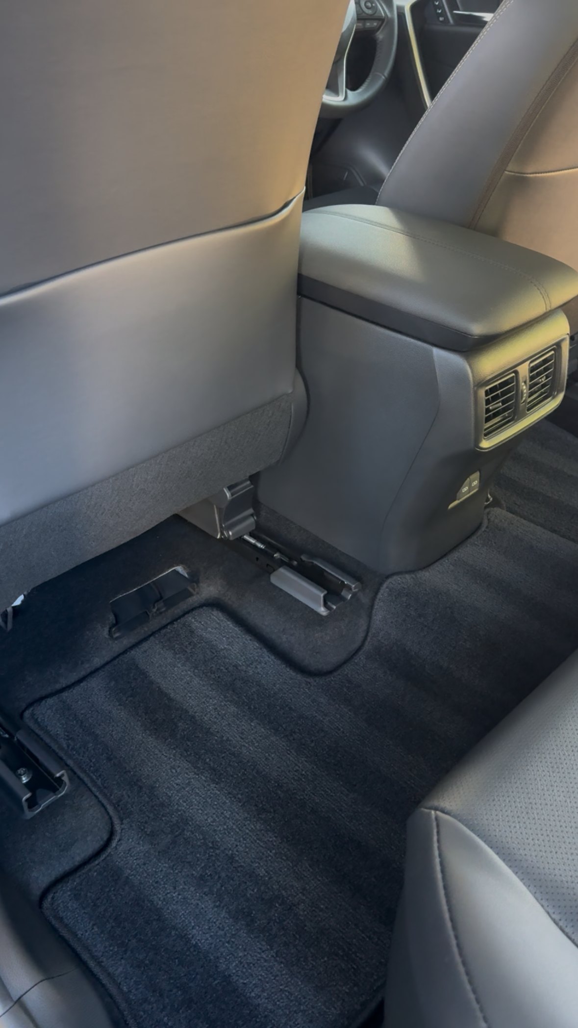 Toyota RAV4 rear floor and console vacuumed and cleaned