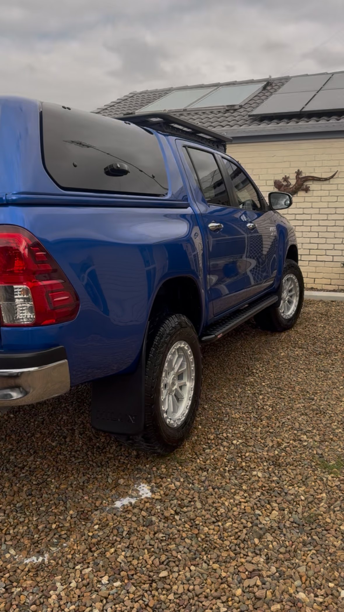 Blue Toyota Hilux with canopy freshly detailed