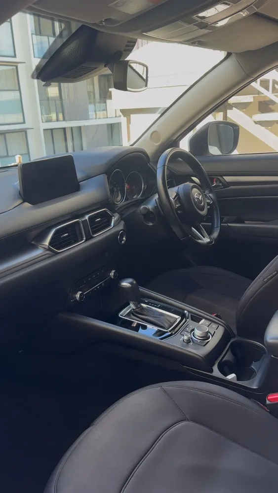 Mazda CX-5 interior detailed: dashboard, steering wheel and leather seats cleaned